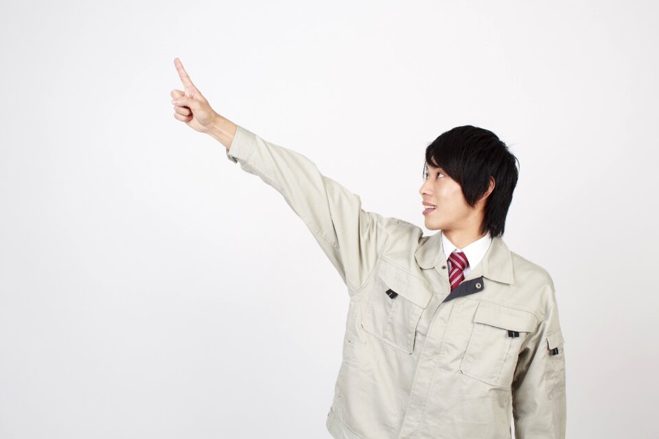 Worker man pointing finger