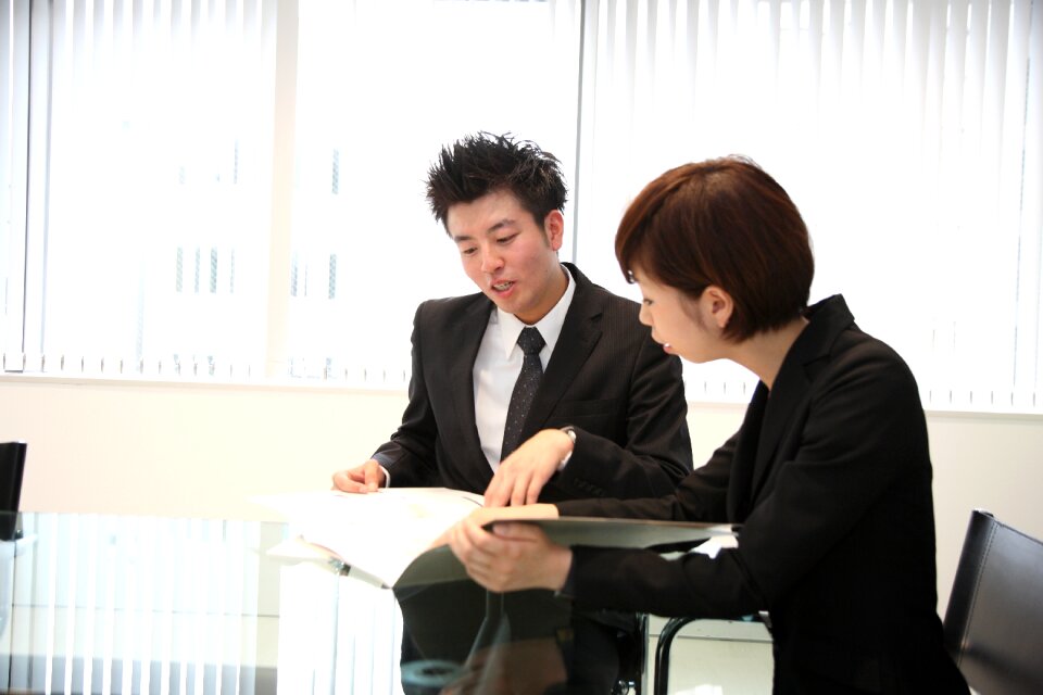 Businessman businesswoman meeting