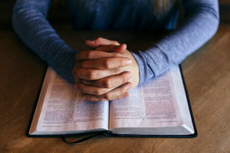 Bible hands pray photo