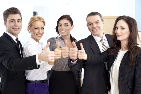 Business team thumbs up photo