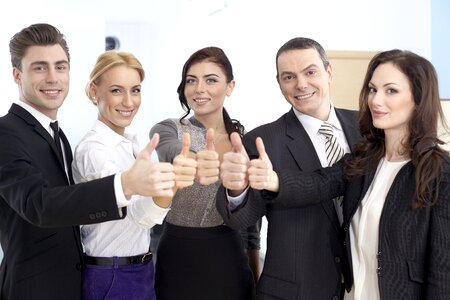 Business team thumbs up
