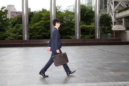 Business man walking photo