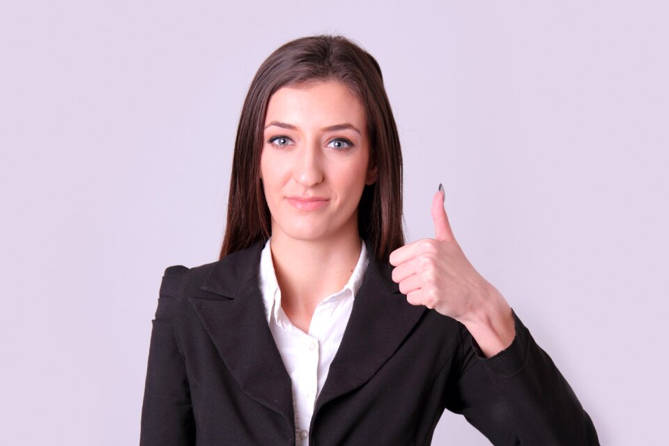 Businesswoman thumbs up