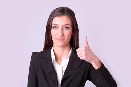 Businesswoman thumbs up photo