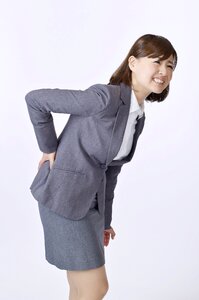 Businesswoman low back pain photo