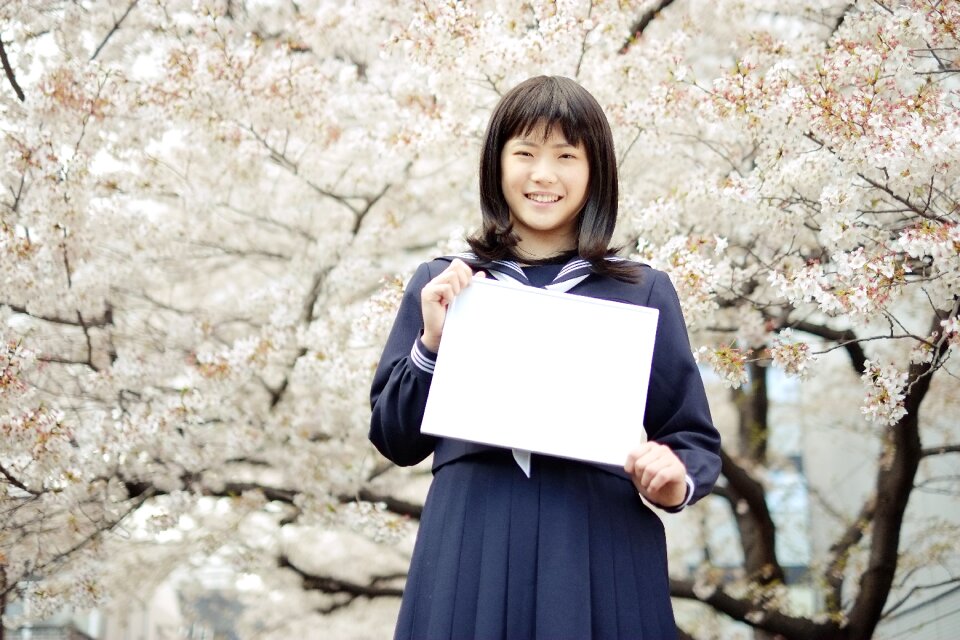 Female student cherry blossoms