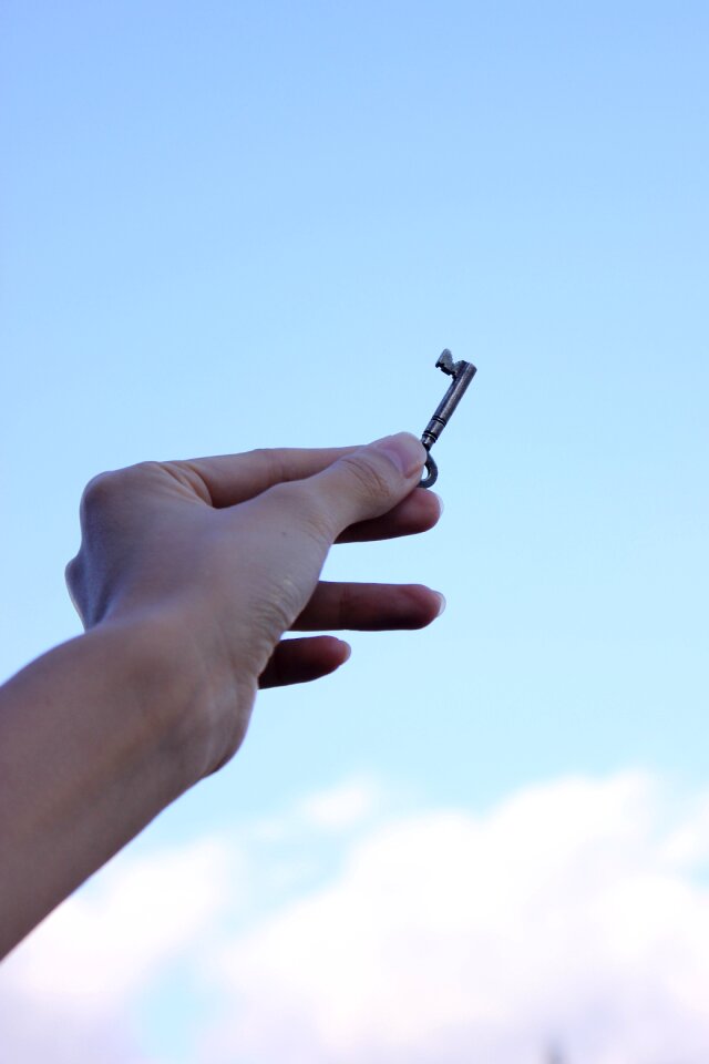Key hand sky
