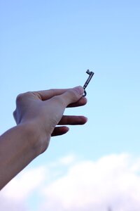 Key hand sky photo