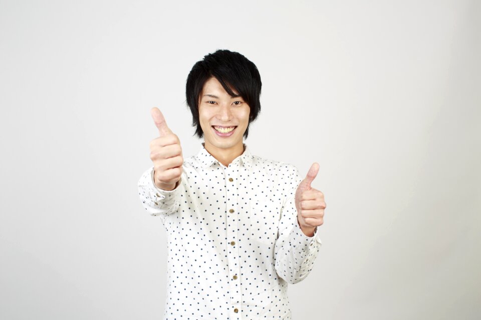 Man portrait good thumbs up