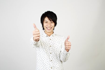 Man portrait good thumbs up