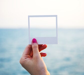 Photo frame hand sea