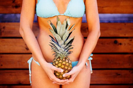 Pineapple bikini woman photo