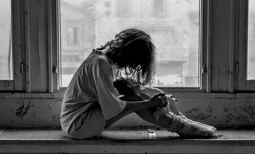 Woman depressed doll