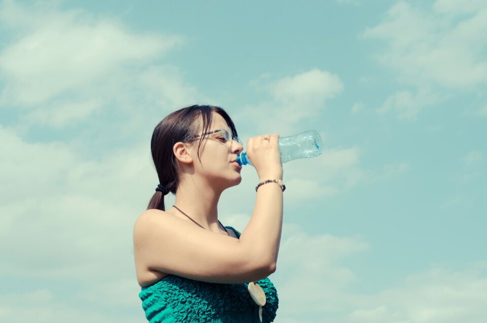 Woman girl drinking water