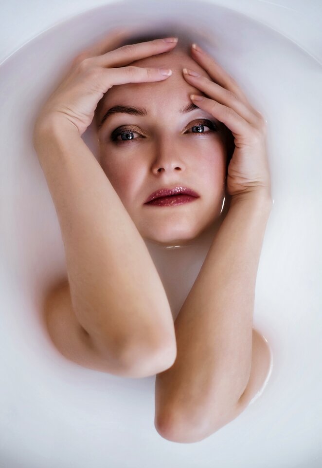 Woman girl milk bathing