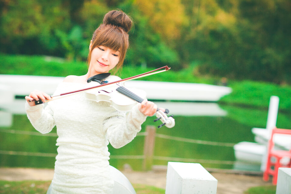 Woman girl playing violin