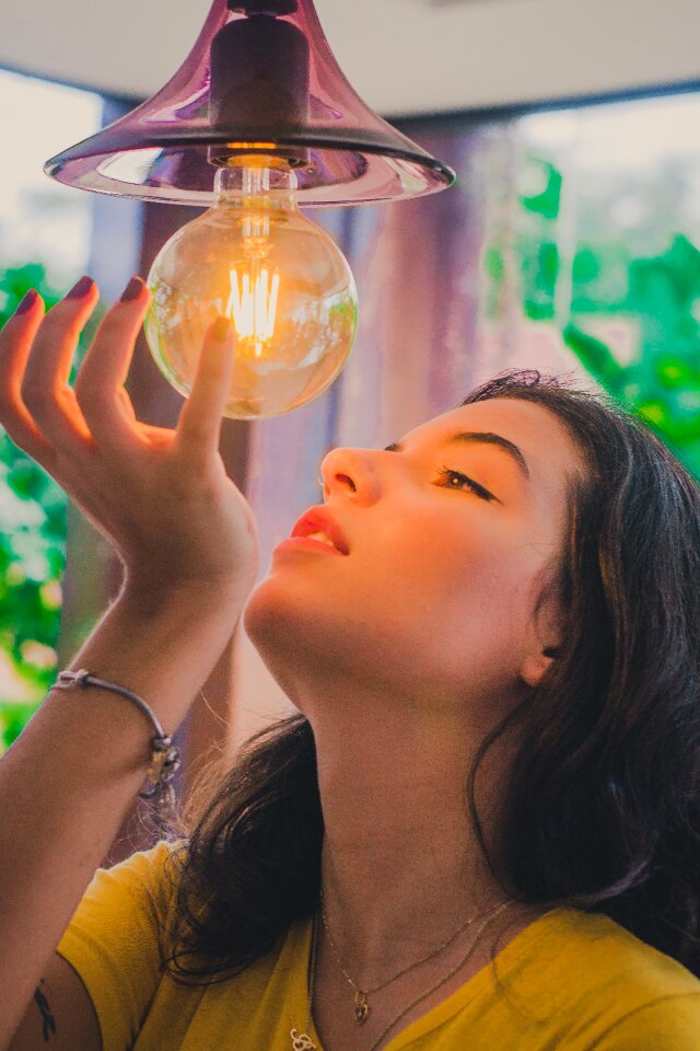 Woman girl light bulb