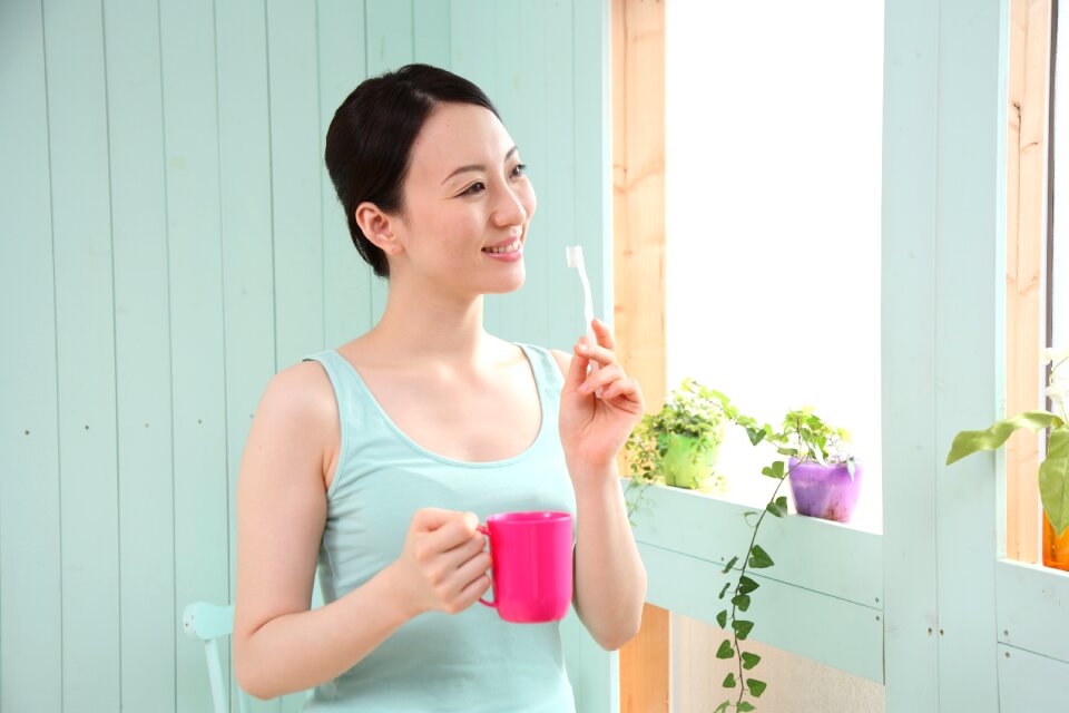 Woman girl toothbrush