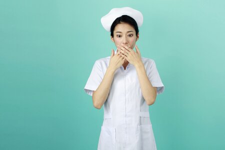 Woman nurse shocked photo