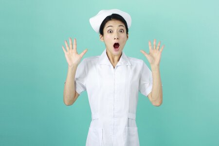 Woman nurse surprised photo