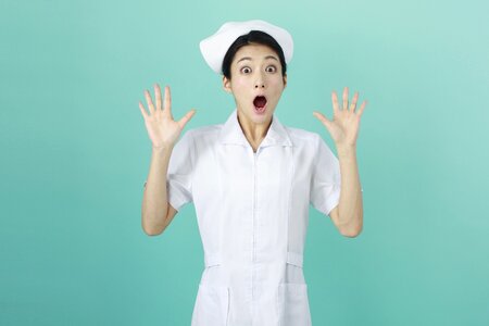 Woman nurse surprised