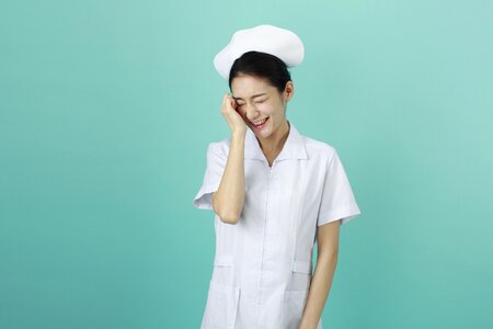Woman nurse shy photo