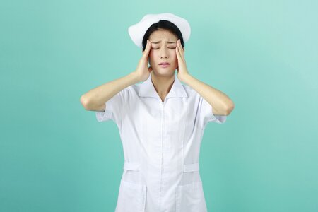 Woman nurse headache