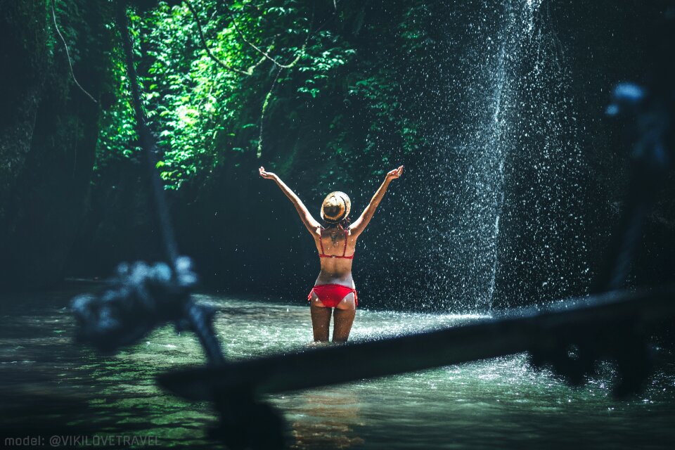Woman splash river bathing