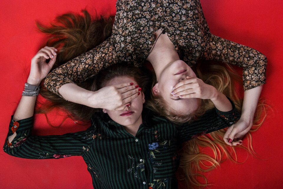 Women girls cover eyes