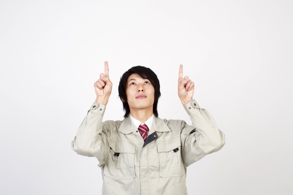 Worker man pointing finger