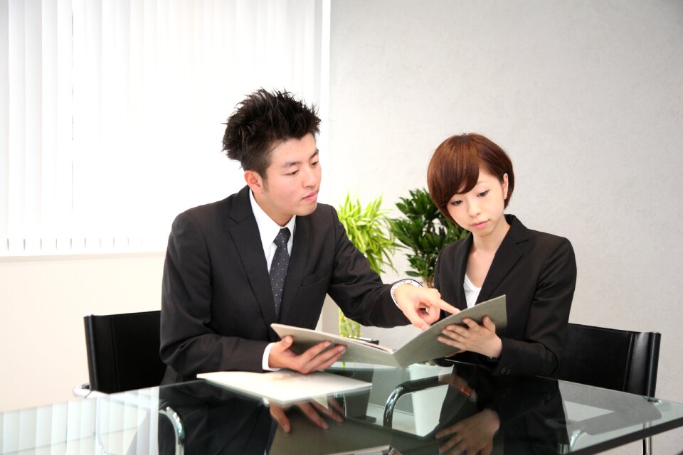 Businessman businesswoman meeting