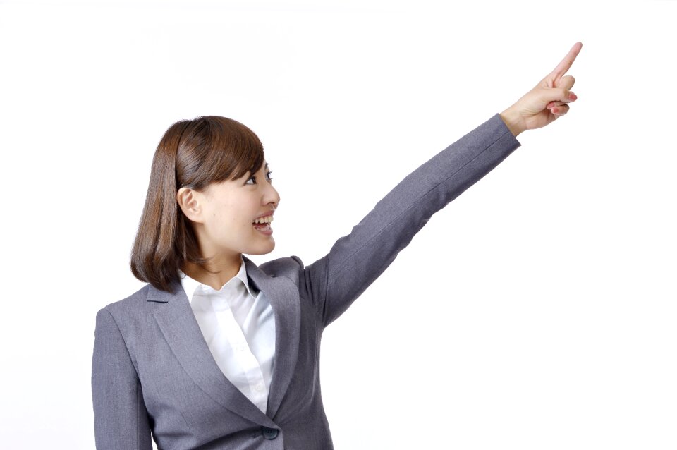 Business woman pointing finger