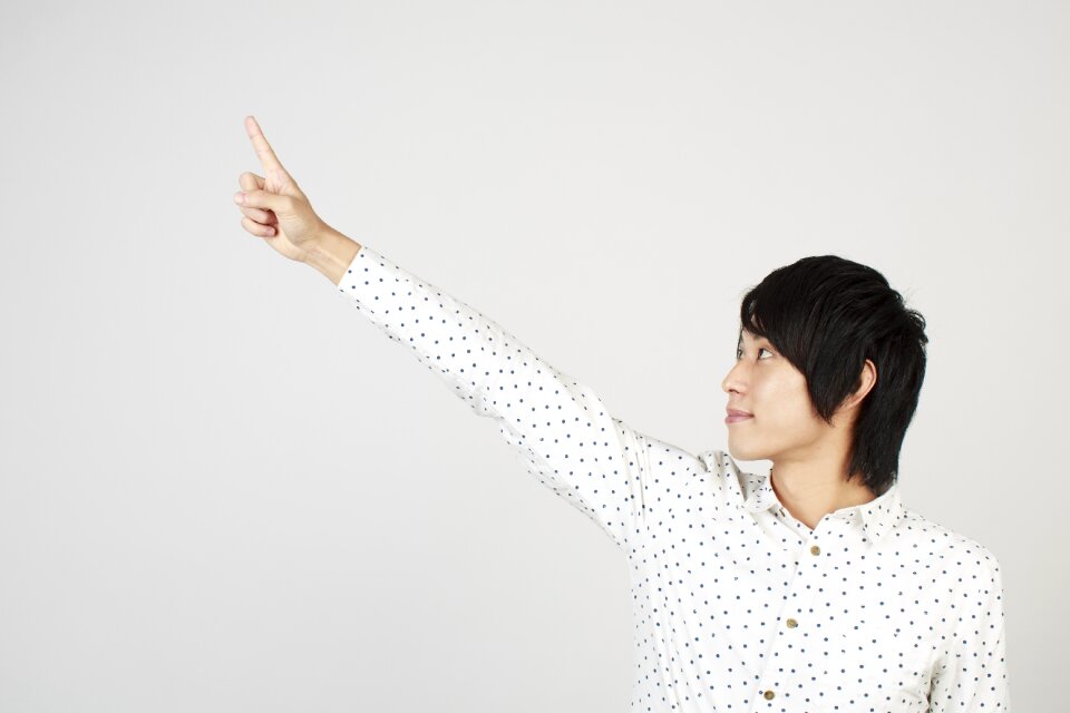 Man portrait pointing finger