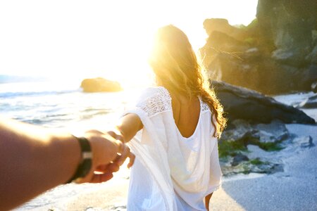 Couple holding hands photo