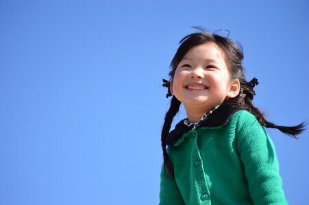 Little girl blue sky