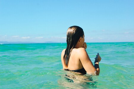 Woman girl sea bathing photo
