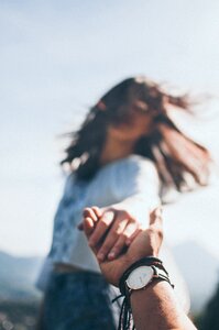Couple holding hands
