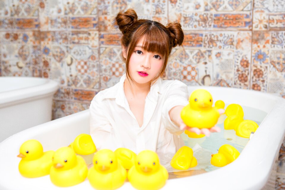 Woman bath rubber duck