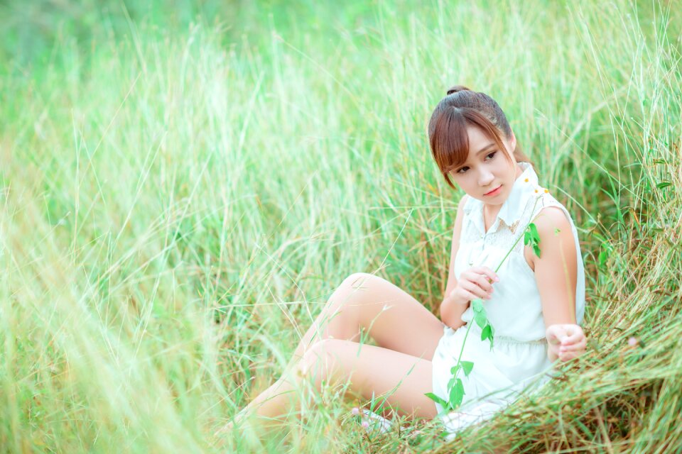 Woman girl portrait grass photo