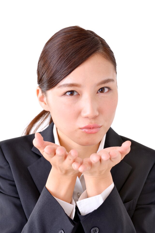 Business woman blow a kiss