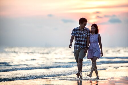 Couple beach sunset photo