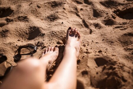 Feet legs beach photo
