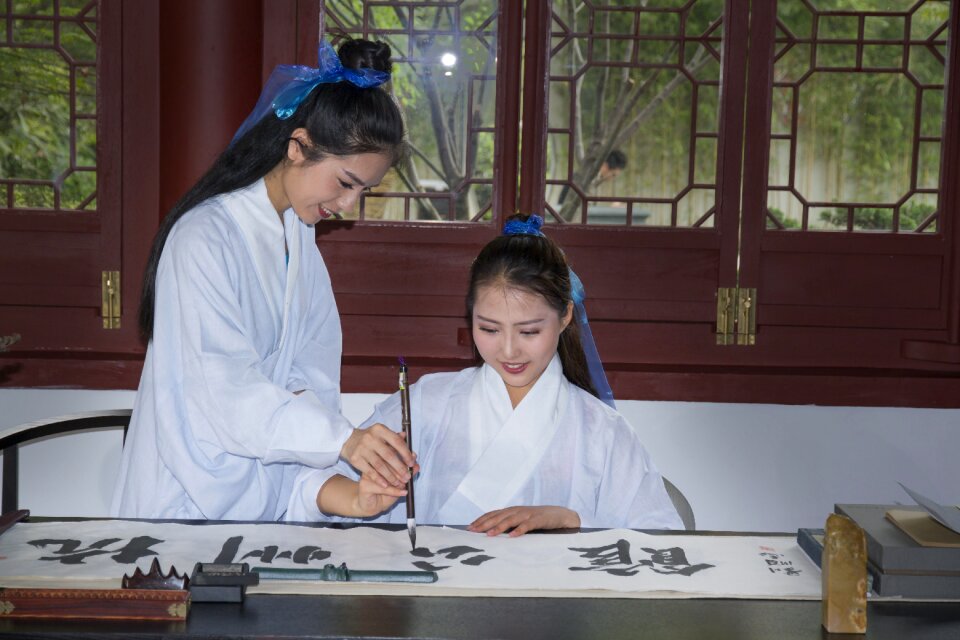 Calligraphy women writing