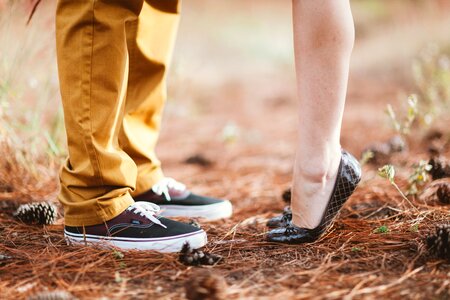 Couple kiss feet