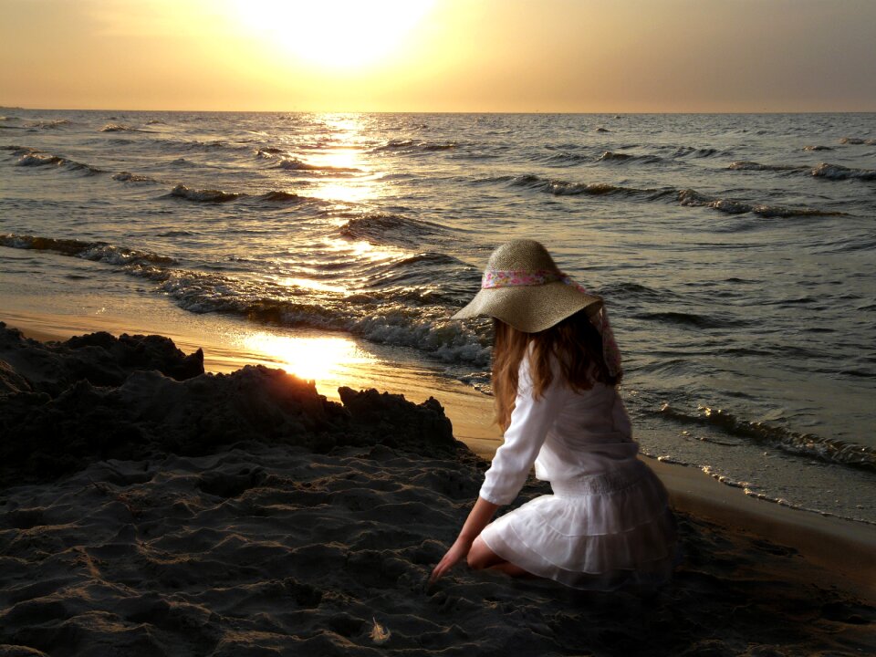 Girl sunset beach photo