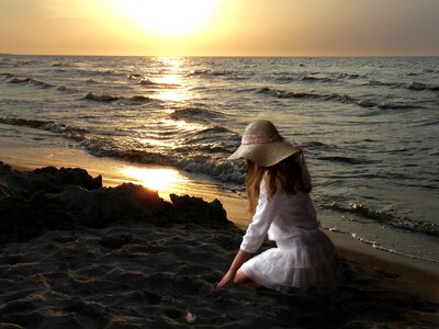 Girl sunset beach photo