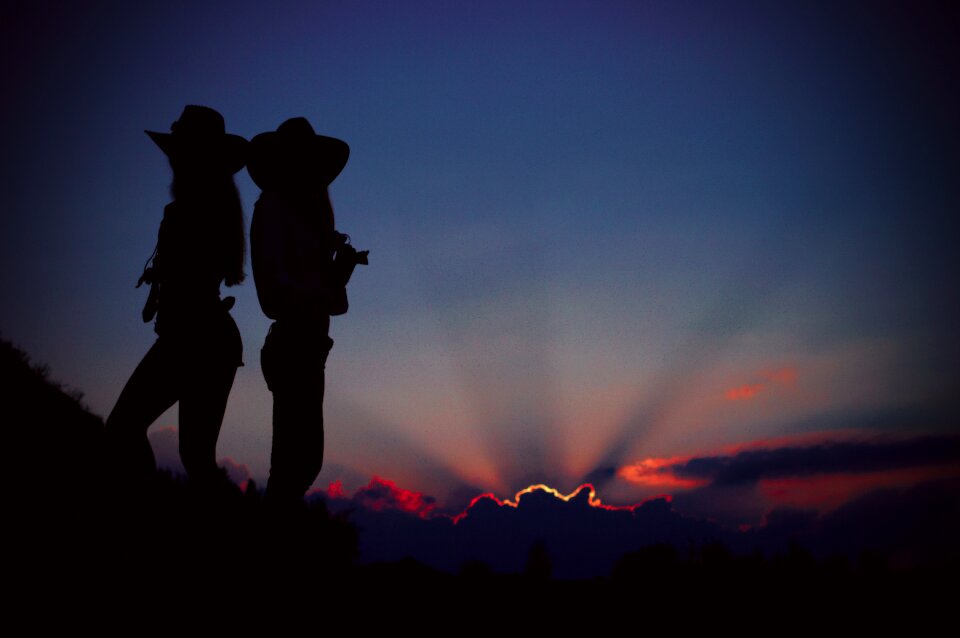 Cowgirls silhouette sunset