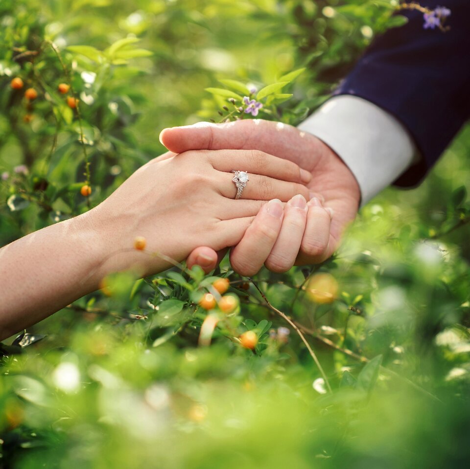 Holding hands bride groom
