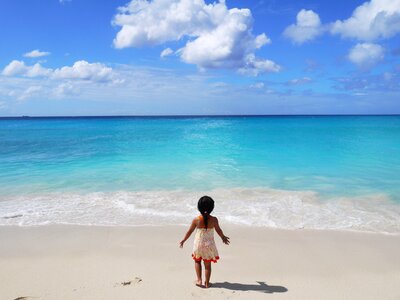 Little girl sea beach photo
