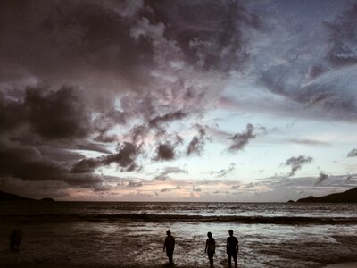 Nightfall sea people photo